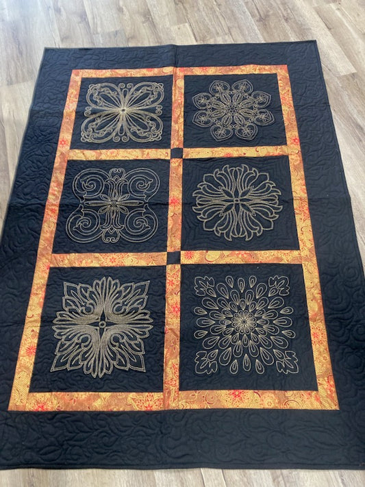 Embroidered Quilt 50" x 68" Custom quilted $200.00