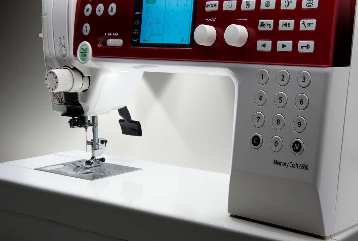 Janome MC6650 Sewing and Quilting Machine