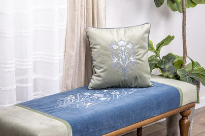 Baby Lock Radiance sewing and embroidery machine showcasing a custom embroidery design on a quilted bench runner and a decorative accent pillow.